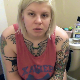 A fat, blonde girl with a lot of tattoos takes a shit and piss while sitting on a toilet. Nice plop sounds with farts. After wiping her ass and flushing, she plunges the toilet. Presented in 720P HD. About 5 minutes.